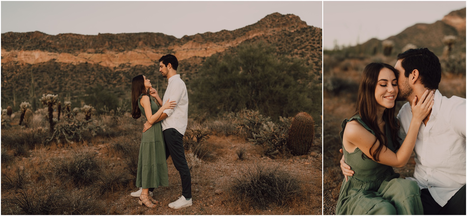 couple taking portraits for their desert engagement session, wearing green and tan posing among cactus
