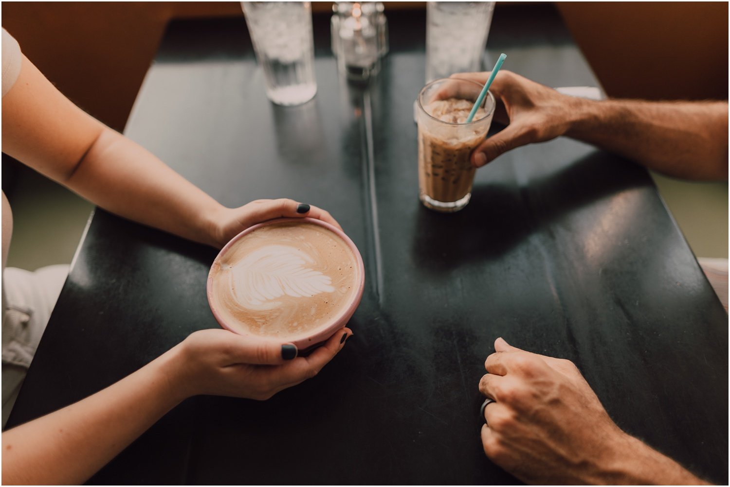 photos of couple drinking coffee together on a date at liberty market in gilbert, arizona