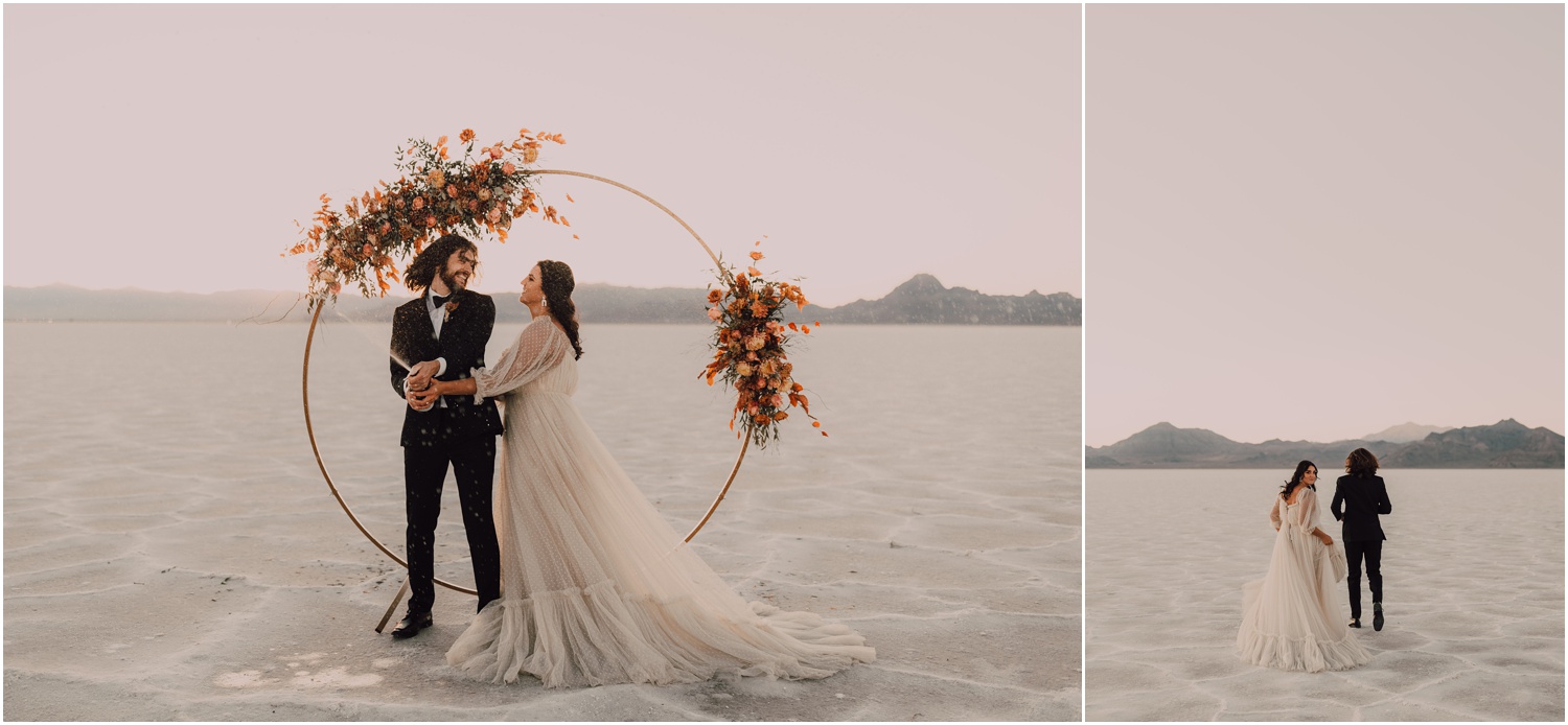 couple posing in front of gold circle arch during salt flats bridal session 
