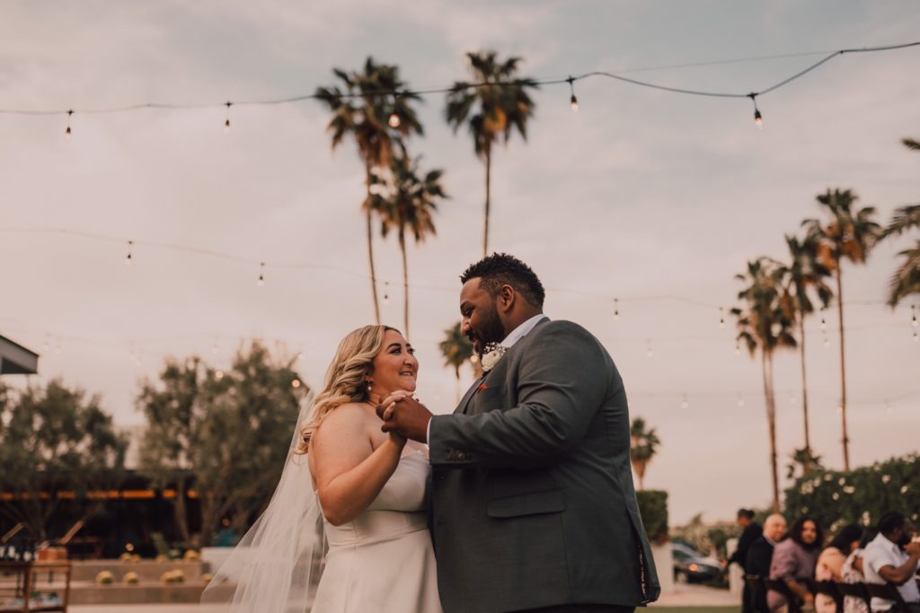 bride and groom first dance at intimate desert wedding in scottsdale, arizona, captured by Riss + Steven Photography