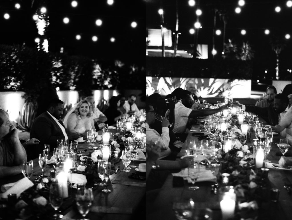 bride and groom eating dinner with their guests at intimate desert wedding in scottsdale, arizona, captured by Riss + Steven Photography