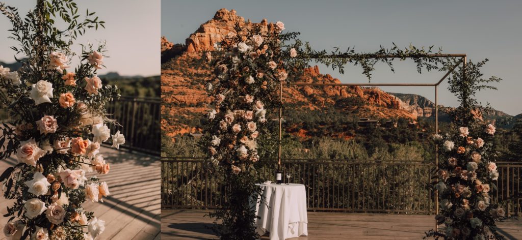 ceremony chuppah in sedona decorated with roses and greenery