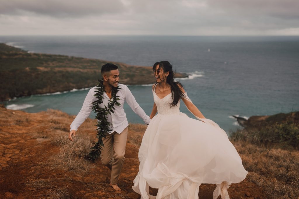 cliffside elopement on Oahu, Hawaii. Captured by Riss and Steven Photography, destination elopement photographer