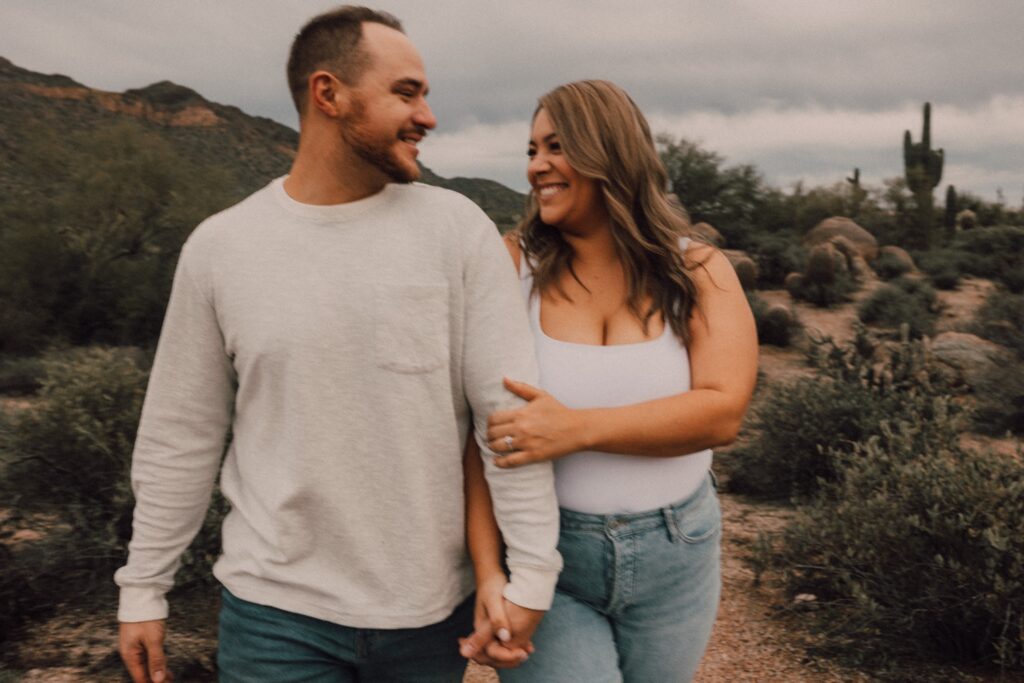 sunset engagement session in the arizona desert. captured by Riss and Steven Photography, destination wedding and couples photographer