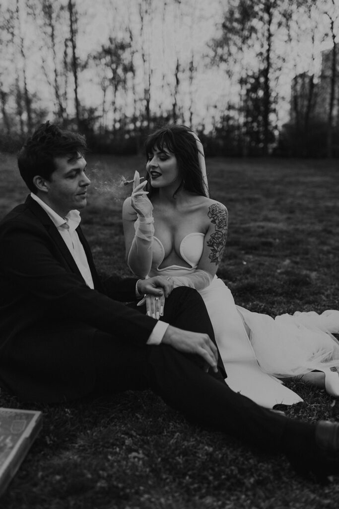 Wedding portraits at Brooklyn Bridge Park smoking a joint 