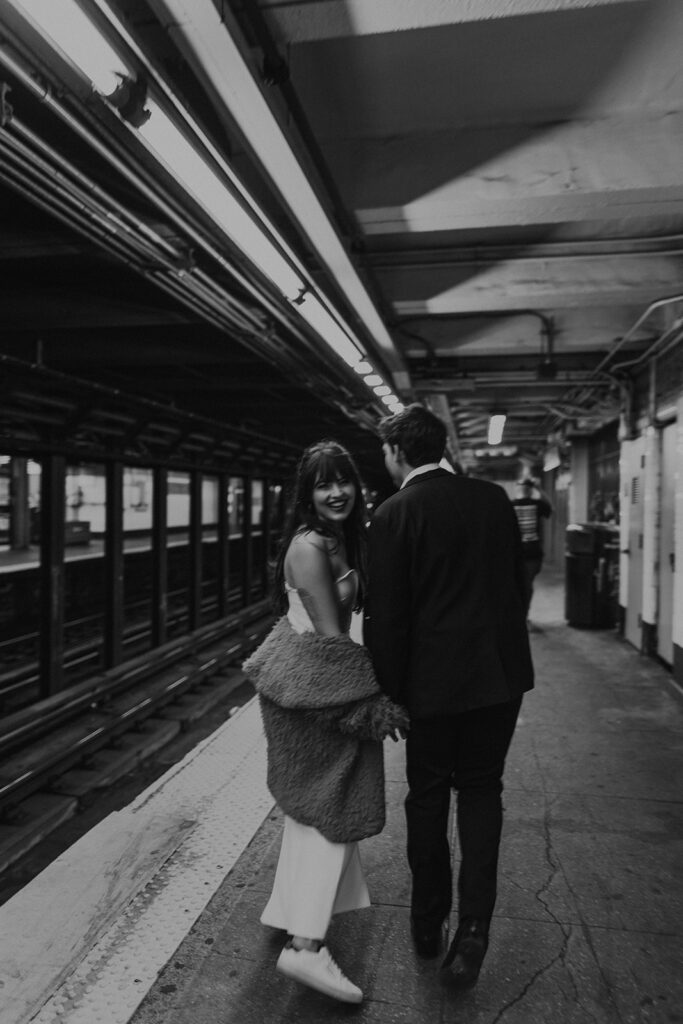 Couple getting on the subway in New York City 