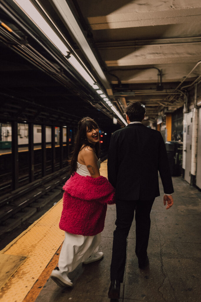 Couple getting on the subway in New York City 