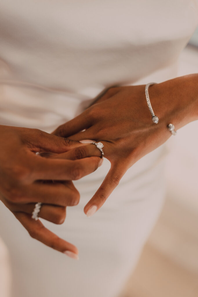 Bride getting ready on wedding day with Jewelry