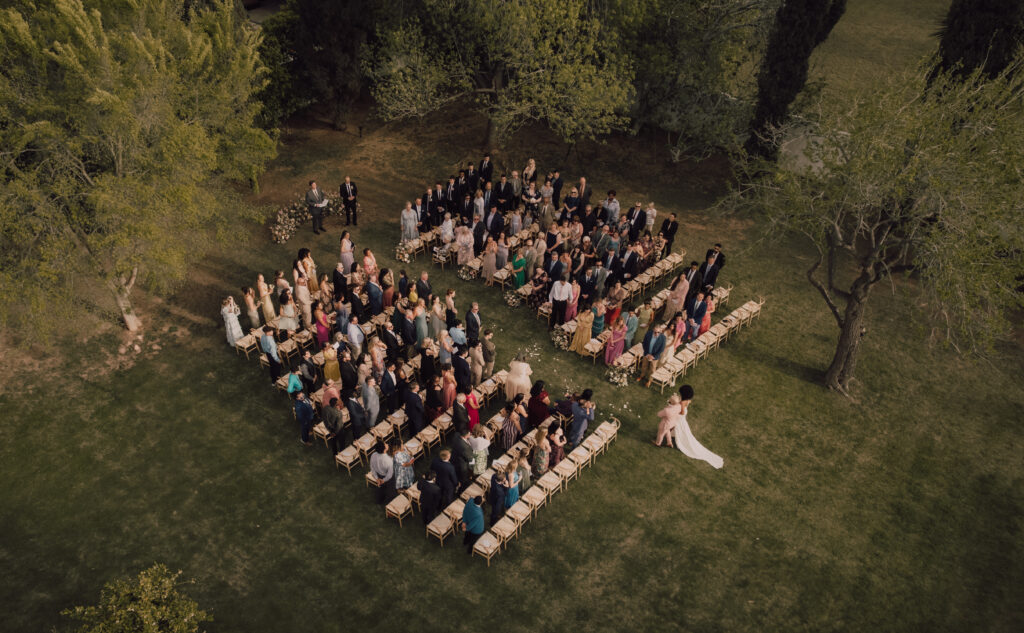 drone shot of an outdoor wedding ceremony