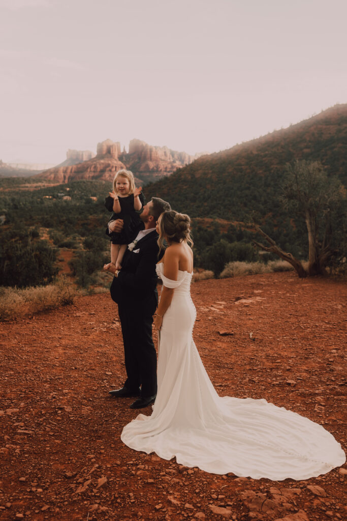 bride groom and daughter