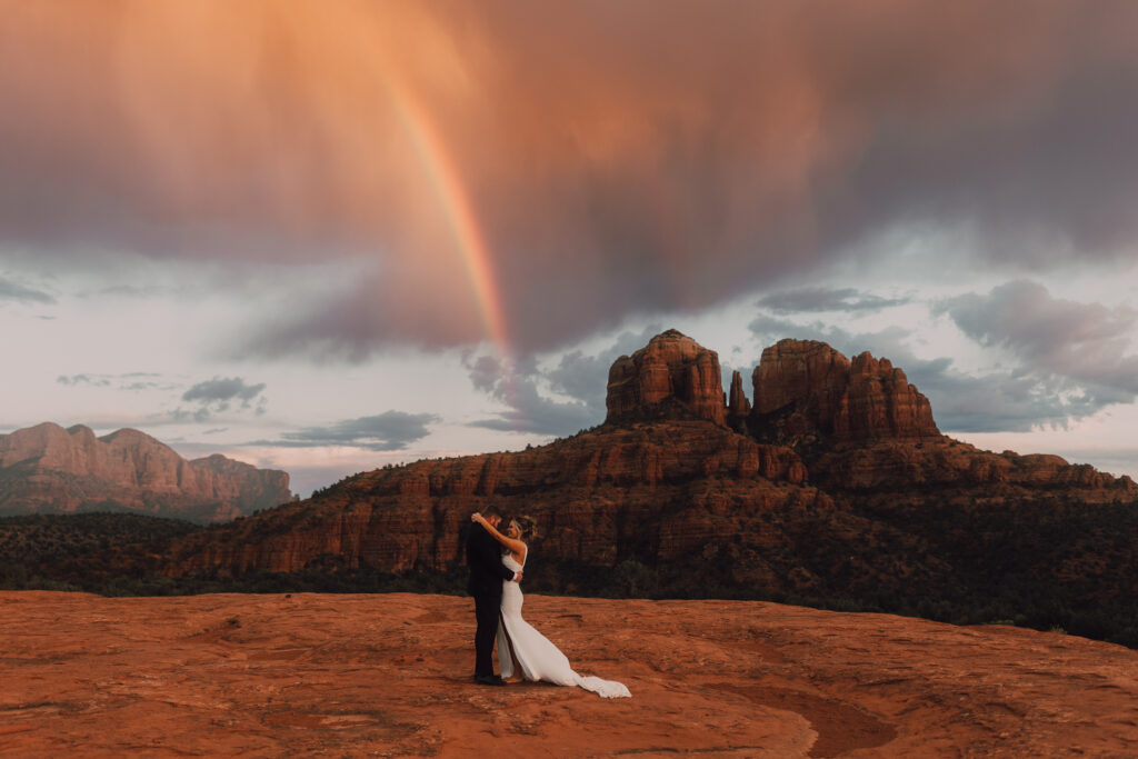 rainbow bride and groom Sedona elopement sunset