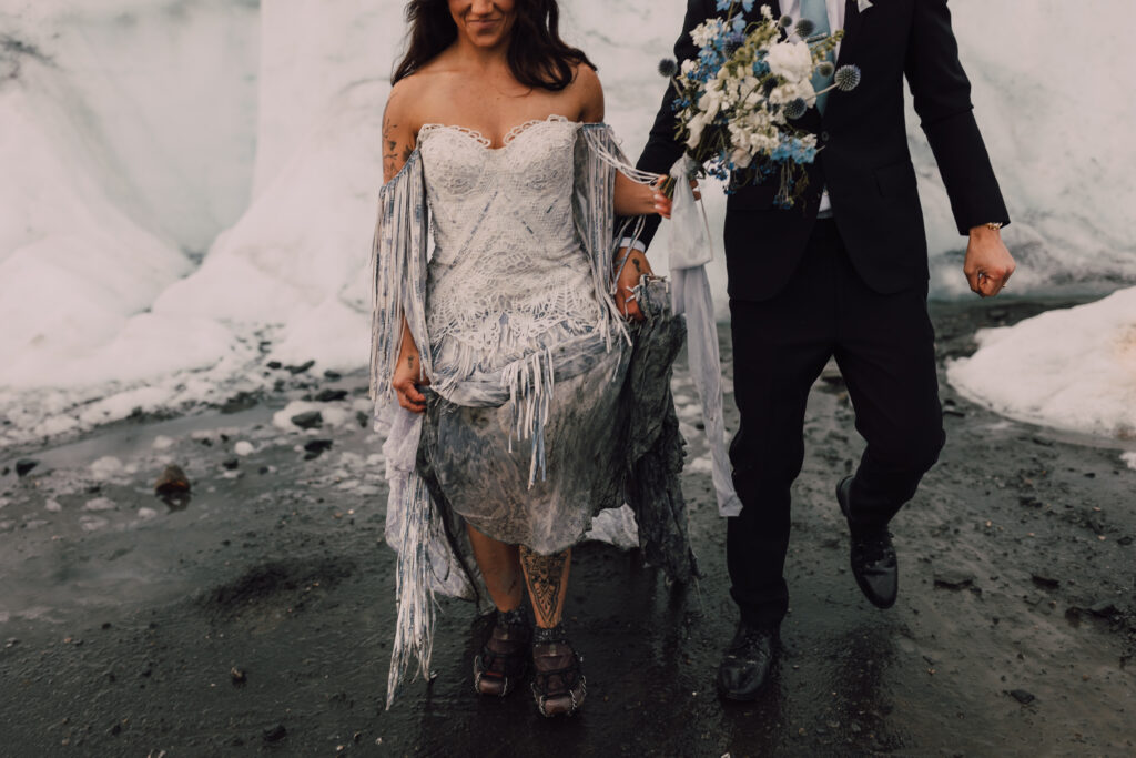 close up of bride and groom elopement through glaciers