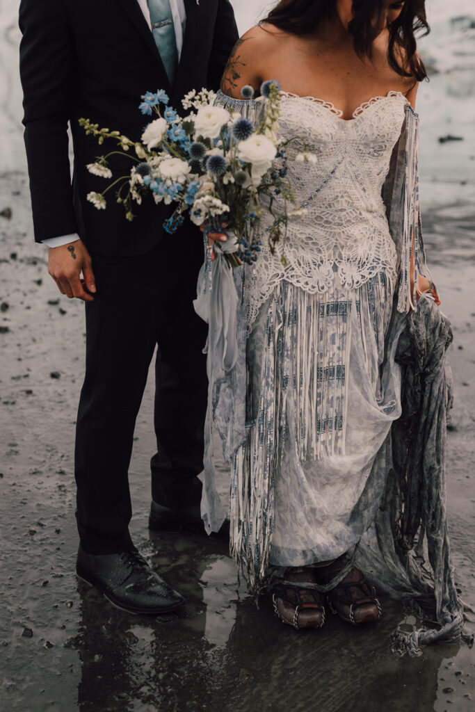 close up of bride and groom elopement through glaciers