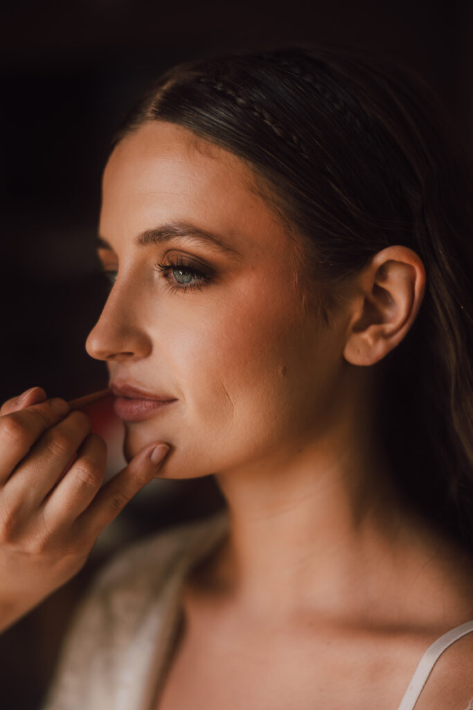 bride getting makeup done 